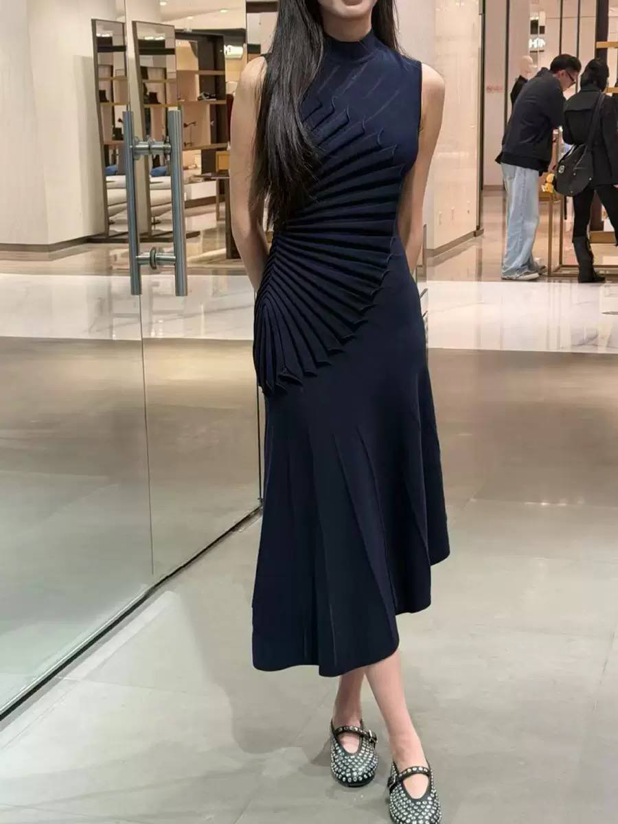 Alaia sleeveless high neck midi dress